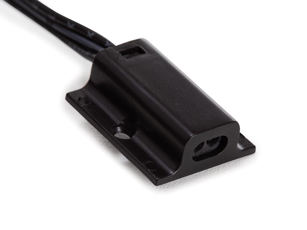 Interruptor sensor puerta IR 12V/24V superficie. Mod. LQS02